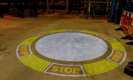 Leading crane service company improves workplace safety with projected signage